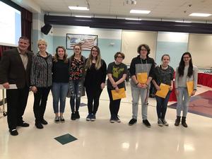 seven students hold awards