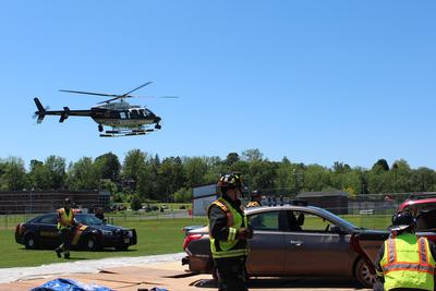 helicopter arrives at mock car crash