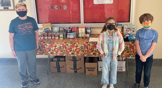Fifth-grade student council organizes food and gift drive
