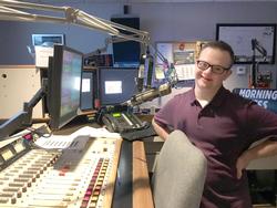 Ian Coe in a radio broadcasting control room